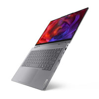 Grey Lenovo ThinkBook 14 2-in-1 laptop angled open showing keyboard and vibrant touchscreen display.